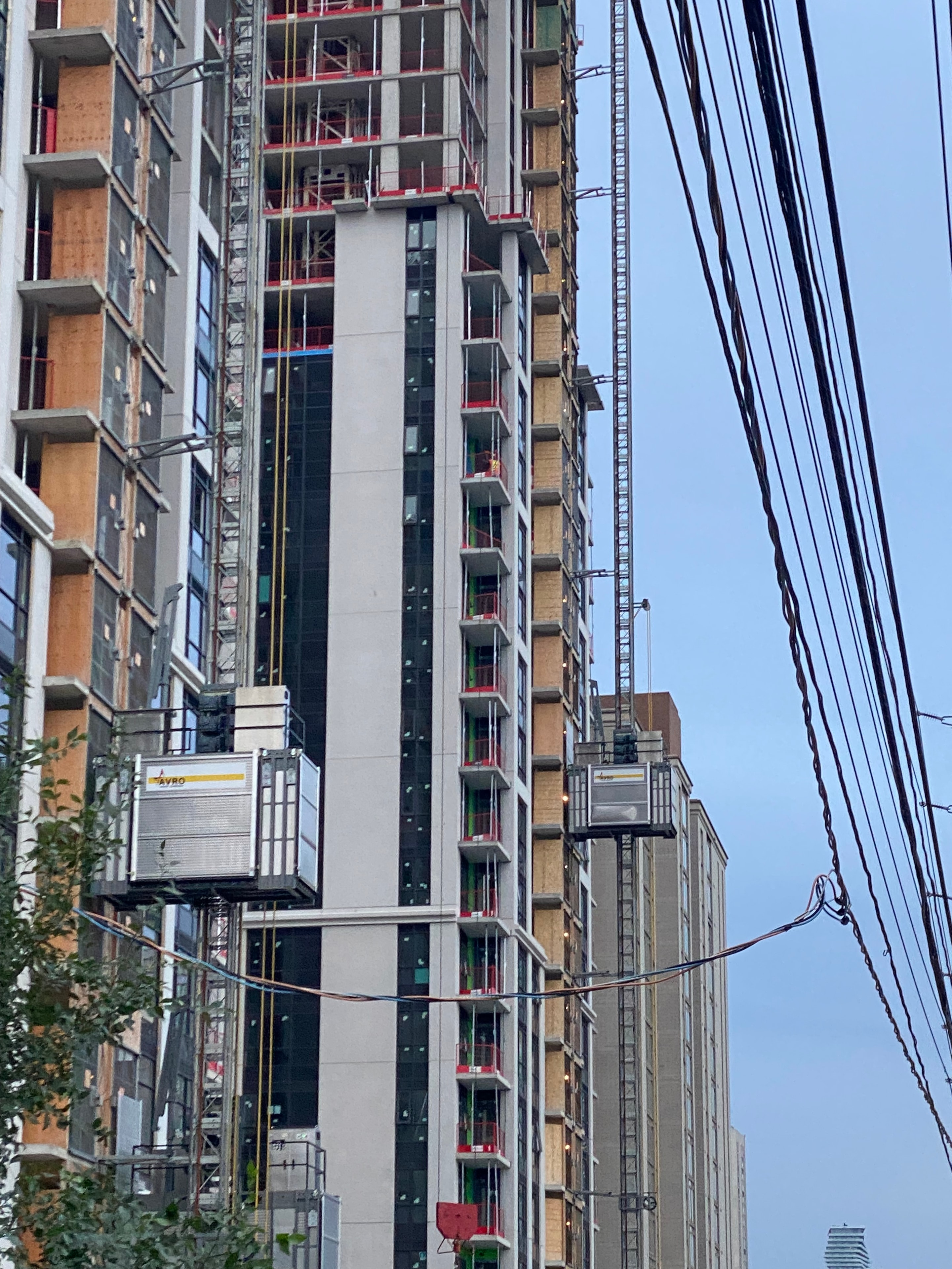 EDMT mechanic servicing elevator machinery on site